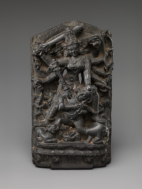 Stone relief of the goddess Durga slaying the buffalo demon Mahishasura